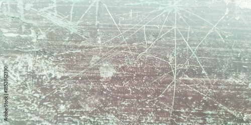 Abstract grunge texture with scratches and a piece of paint. Grey street wall background. Grunge texture perfect for aged effect. Old dirty texture for your design