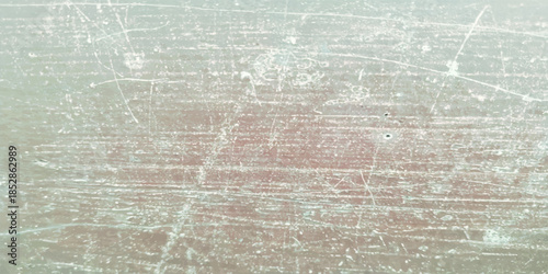 Abstract grunge texture with scratches and a piece of paint. Grey street wall background. Grunge texture perfect for aged effect. Old dirty texture for your design