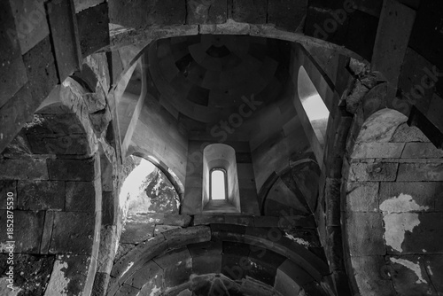 Monastery interior. An old lamp in the church. Sunlight streaming through the windows. Christianity and religion.