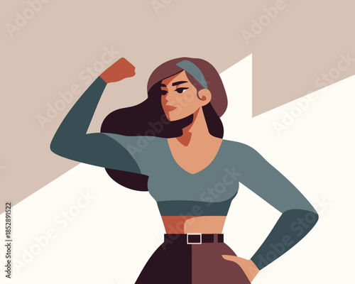 Confident woman flexing her arm in a powerful pose with long hair