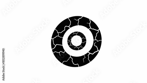 Abstract target symbol with cracked texture, representing challenge and imperfection