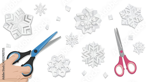 A hand holding blue-handled scissors cutting out a paper snowflake, surrounded by other paper snowflakes and small paper scraps.