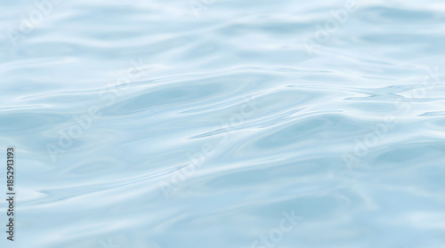 Clear water surface texture with soft light reflections