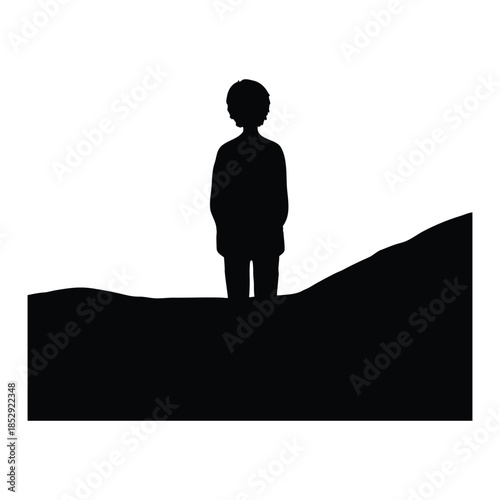 Silhouette of a person standing and staring at the distant horizon
