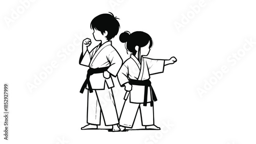 Two children in karate uniforms practice martial arts poses.