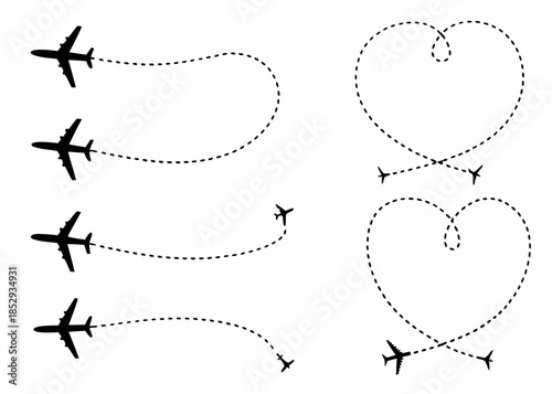 Airplanes tracing flight paths in the sky including heart shaped trails