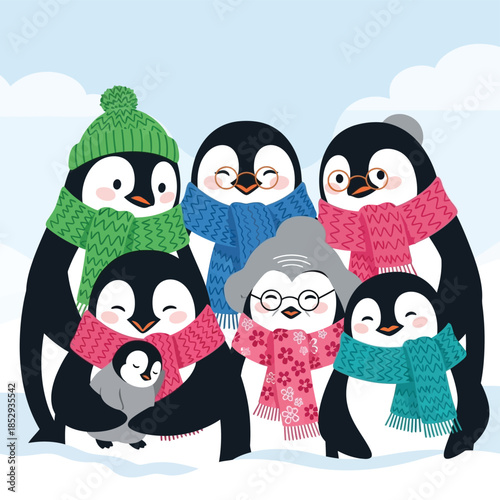 Group of penguins in winter clothing standing together in a snowy landscape