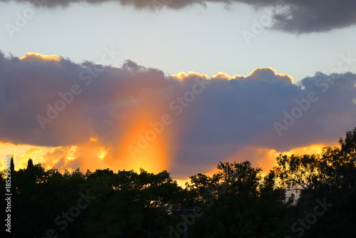 colorful dramatic sky with cloud at sunset, closeup of photo