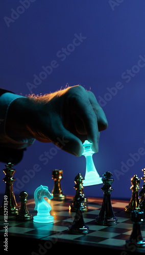 Billede på lærred Glowing chess king placed on board in decisive position