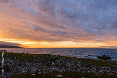 Russia, Murmansk region, Rybachy Peninsula. Sunset on the Barents Sea coast. August 2025