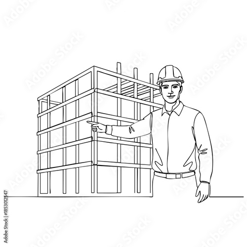 A man in a hard hat stands in front of a building, pointing to it. Concept of construction and hard work, as the man is likely a worker in the building industry. The building itself is tall