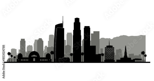 Silhouette of Los Angeles skyline with palm trees and Griffith Observatory