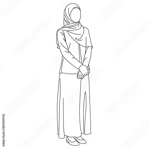 Woman standing with hands clasped in modest attire