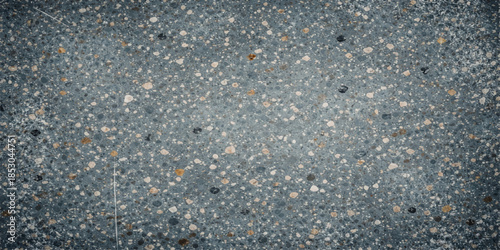 Rough blue jeans texture background featuring an abstract grey stone pattern with a weathered asphalt surface and old concrete material detail