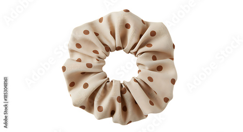 A beige and brown polka dot scrunchie isolated perfect for hair accessories on transparent background.
