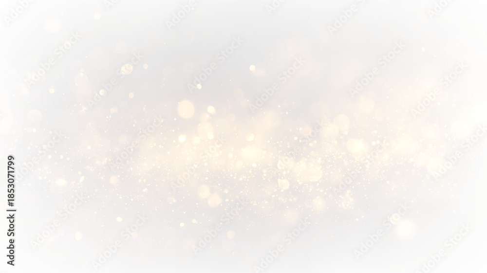 Fototapeta premium Gold particles float on a transparent background creating a bright and shimmering effect during a festive celebration or event