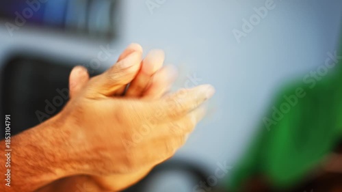 Close-up video of hands applying hand sanitizer, showing personal hygiene, germ protection, and health safety practices in daily life.