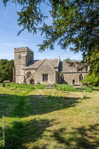 The parish church of St Peter dating back to the 13th century in the Cotswold village of Alvescot, Oxfordshire, England UK