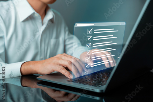Businessman using digital interface with checklist and security icons image