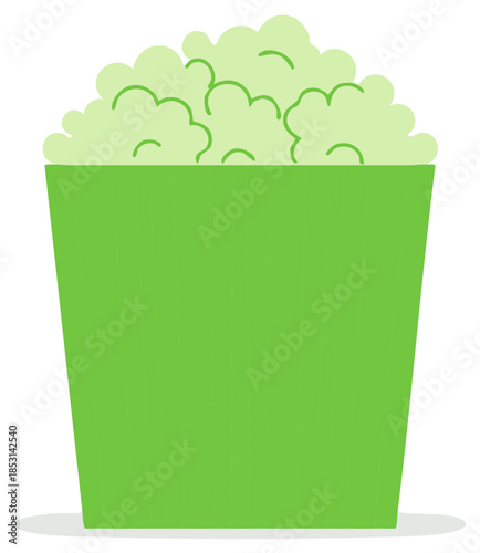 Bright green bucket overflowing with fluffy popcorn snack
