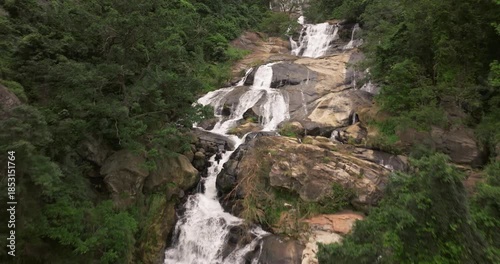 Aerial view of Ravana Ella Waterfall Cascading Through Lush Green Forest, Sri Lanka