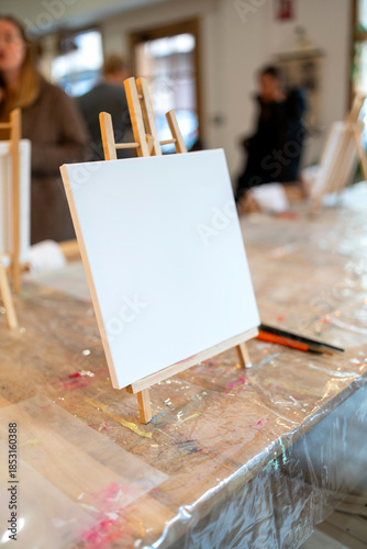 Blank canvas on easel at painting workshop