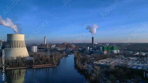 Hard Coal power plant cooling tower emitting steam. Nice aerial view drone