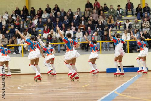 Athletes performing artistic roller skating routine