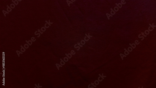 rich burgundy leather texture captivates with subtle grain patterns evoking opulent mystery ideal for premium wallpaper or editorial backdrop with seamless copy space