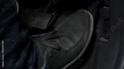 Accelerate and Brake. Foot pressing foot pedal of a car to drive ahead. Man driving car by pressing Accelerator and Brake in car. Driver driving the car by pushing accelerator pedals of the car inside