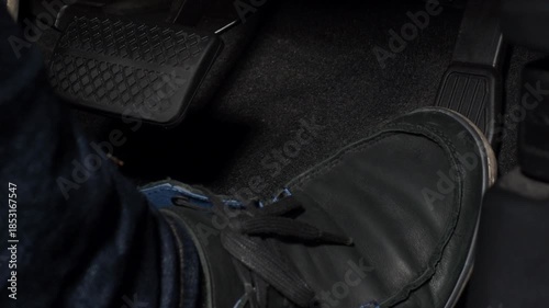 Accelerate and Brake. Foot pressing foot pedal of a car to drive ahead. Man driving car by pressing Accelerator and Brake in car. Driver driving the car by pushing accelerator pedals of the car inside