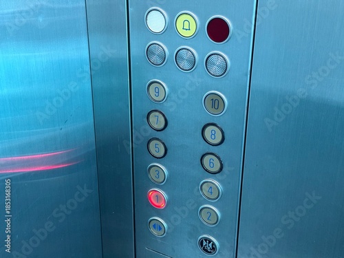 Close-up of a modern elevator control panel with floor selection buttons