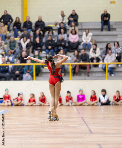 Young skater performing artistic roller skating routine