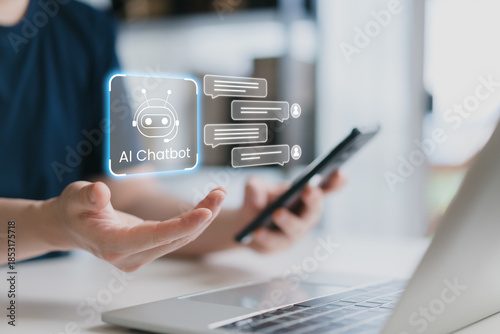 Man hands holding smartphone with virtual AI chatbot assistant icon and speech bubbles on screen. Concept for conversational artificial intelligence, digital customer support, and smart technology.