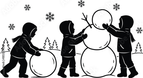 Children happily building a snowman in snowy park