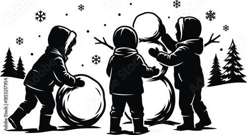 Children happily building a snowman in snowy park