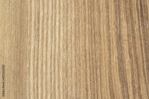 Light brown natural wood texture with vertical grain lines and soft organic surface pattern.