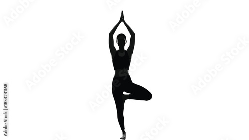 Woman in tree pose yoga silhouette representing balance mindfulness wellness and inner peace concept
