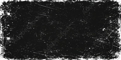 Abstract black and white grunge background featuring a cold blue water splash with liquid drops falling on a clean wet surface texture