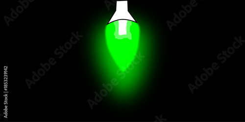 A vibrant green glowing light bulb illuminates a dark background, creating a striking contrast with its luminous glow.