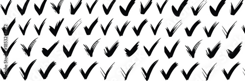 Numerous Black Hand- Drawn Check Mark Symbols on White Background check marks checkmarks