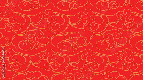 Vibrant red background with intricate yellow cloud patterns