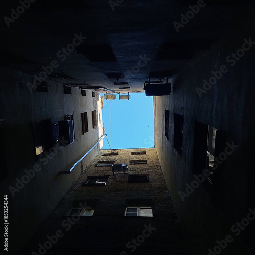 St. Petersburg. The sky from the bottom of a courtyard well.