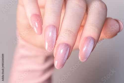 Quadro em tela Przejdź do strony|123456Dalej
Manicure, shiny nails, modern nail art presenting elegant almond-shaped fingernails, soft pink enamel and refined beauty aesthetics