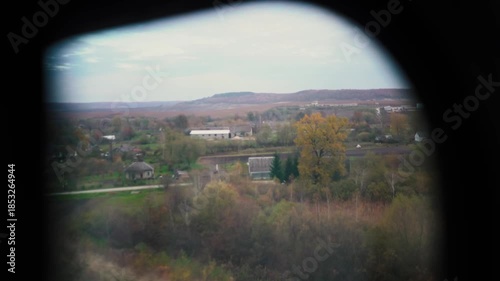 A beautiful view of nature from a train window during a journey. A railway in the mountains.