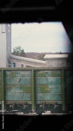 A beautiful view of nature from a train window during a journey. A railway in the mountains.