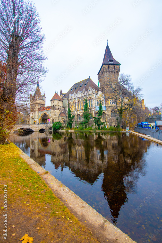 Fototapeta premium Vajdahunyad Castle with waterfront in Budapest at christmas time. Amazing Reflection.