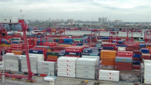 Blurred Container Yard With Stacked Cargo Containers, Buenos Aires Harbor, View From Ship Bridge 