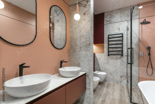 Foto The modern bathroom design is characterized by elegant fixtures and soft colors with a spacious layout