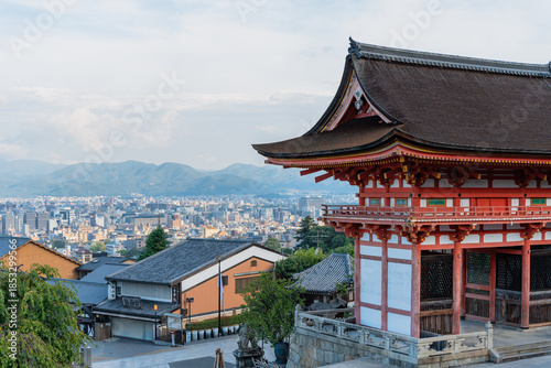 The panoramic early morning view of the Kyoto skyline and distant mountains in Japan.